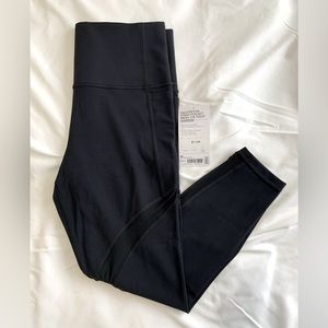Athleta Salutation Stash Pocket Mesh 7/8 Tight